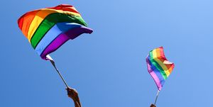 waving rainbow flags