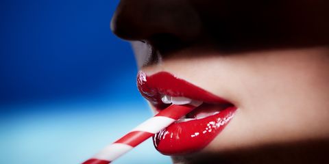 Lip, Red, Beauty, Mouth, Close-up, Material property, Nail, Hand, Lip gloss, Tooth, 