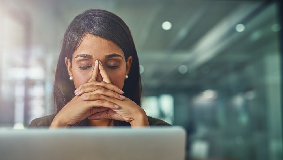 Woman stressed at computer