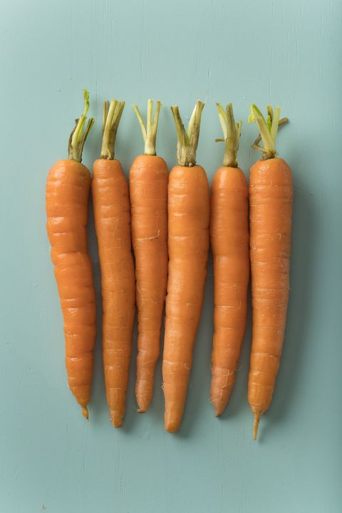 row of fresh orange carrots
