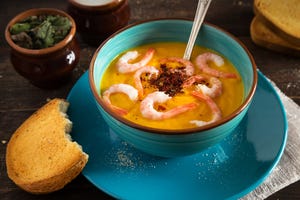 Pumpkin cream soup with shrimps