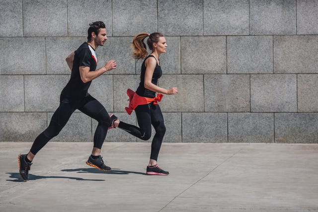 a man and a woman running