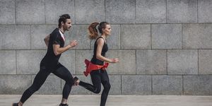 a man and a woman running