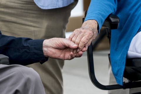 George H.W. Bush and Barbara Bush hold hands during a ceremony in May 2017.