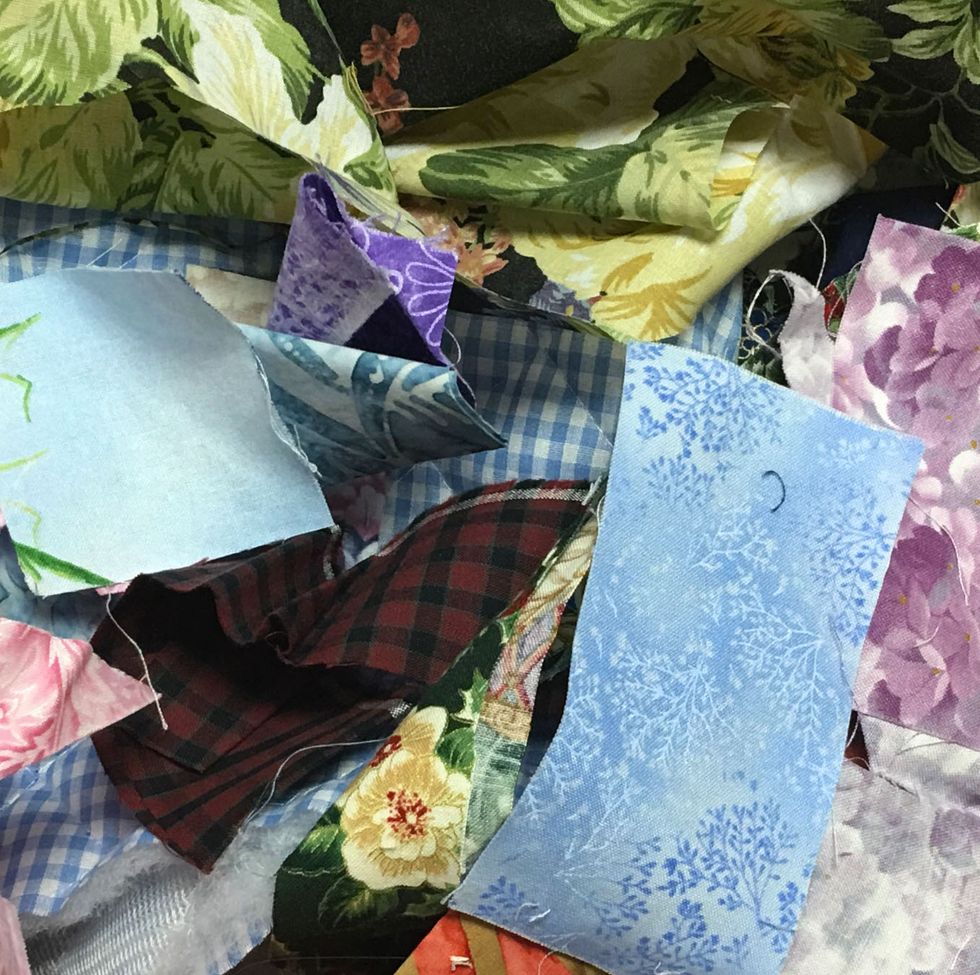 scraps of fabric lay in a pile