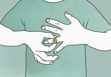 hands engaged in the act of placing a ring on a finger