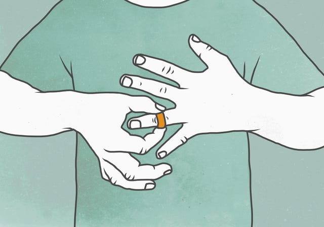 hands engaged in the act of placing a ring on a finger