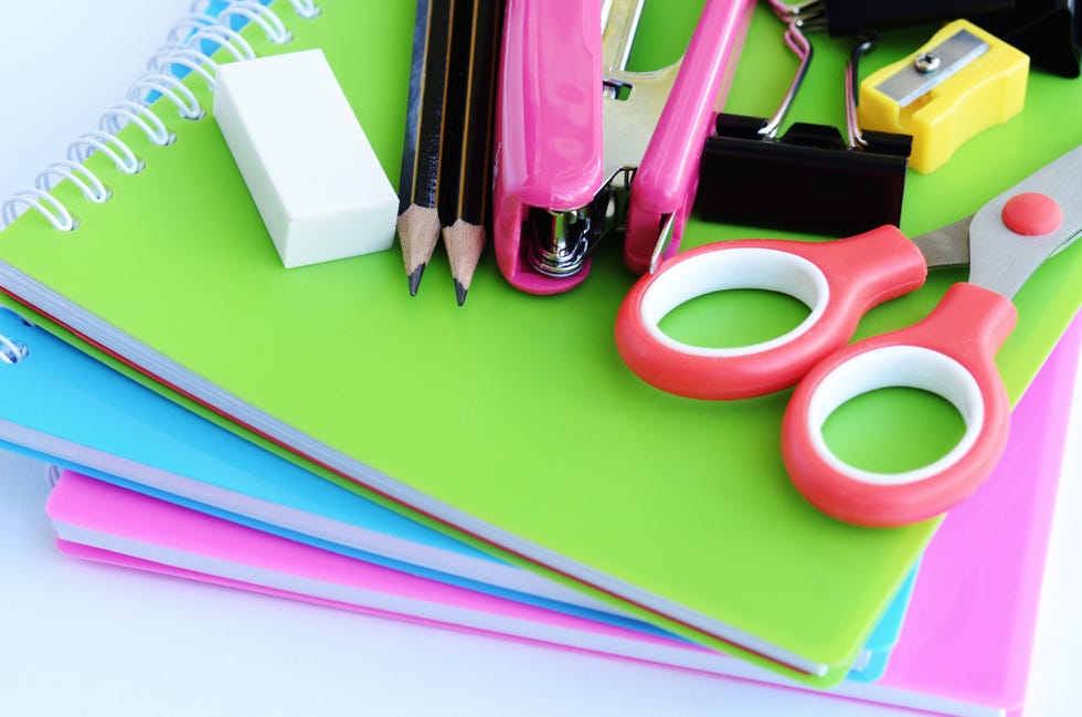 office or school supplies on white background