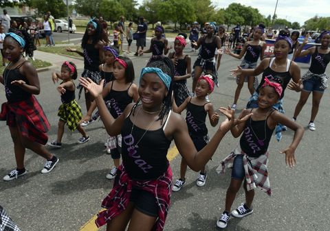 denver, co   june 17 members of divaz dance group join participants in the juneteenth music festival and parade as they make their way down e 26th ave on june 17, 2017 in denver, colorado organizers say its one of denver's longest running parades dating back to the 1950's where "nearly 3,000 people march to honor the struggles and social progress achieved through marches and demonstrations organized for freedom, justice, and equality in our countrys history" this year's theme for the event is dream big photo by kathryn scottthe denver post via getty images
