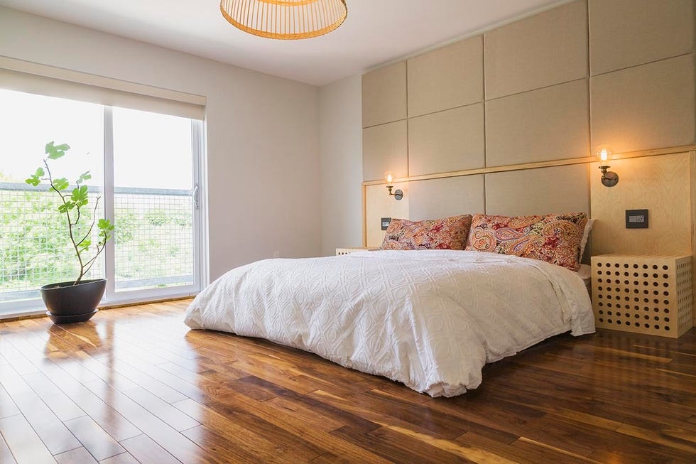 maple hardwood flooring in a master bedroom