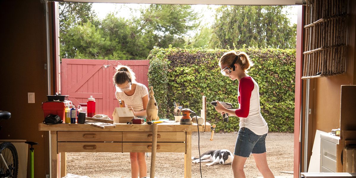 summer craft ideas sisters building birdhouse in garage