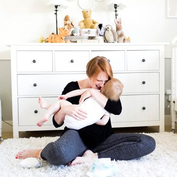 Mother holding son (12-17 months) in nursery baby viral tiktok