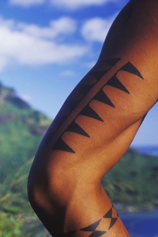 tattoo on a manaposs arm, hawaii, usa