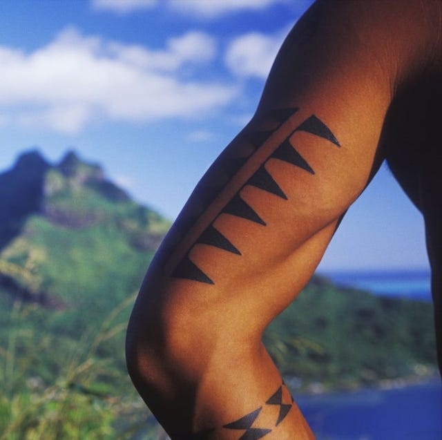 tattoo on a manaposs arm, hawaii, usa