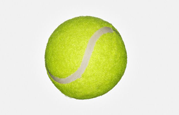 Massage your feet with a tennis ball