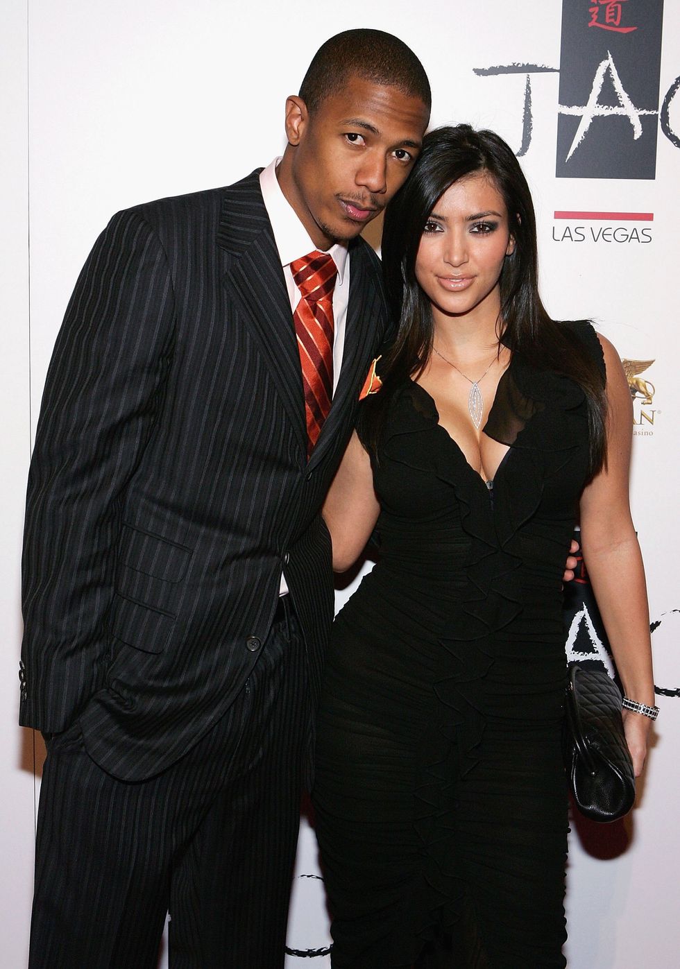 las vegas september 30 actor nick cannon l and kim kardashian arrive at the tao nightclub at the venetian resort hotel casino during the clubs anniversary party on september 30, 2006 in las vegas, nevada photo by ethan millergetty images