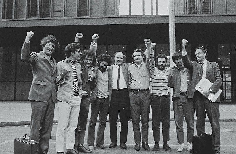portrait of the chicago seven and their lawyers as they raise their fists in unison outside the courthouse where they were on trial for conspiracy and inciting a riot during the 1968 democratic national convention, chicago, illinois, october 8, 1969 they are, from left, lawyer leonard weinglass, rennie davis, abbie hoffman 1936   1989, lee weiner, david dellinger 1915   2004, john froines, jerry rubin 1938   1998, tom hayden 1939   2016, and lawyer william kunstler 1919   1995 froines and weiner were ultimately acquitted on all charges while the others were convicted of inciting to riot though the convictions were overturned on appeal photo by david fentongetty images