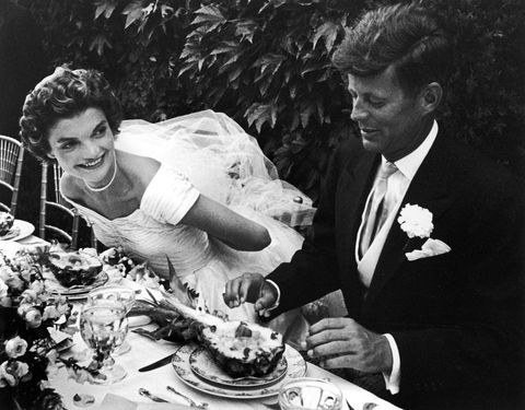 newport, united states   september 01  senator john kennedy and bride jacqueline sitting together outdoors at table, eating pineapple salad ,at their wedding reception  photo by lisa larsenthe life picture collection via getty images