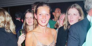 english supermodel kate moss wearing a diaphanous silver dress at the elite model agency party for the look of the year contest at the hilton hotel, london, september 1993 photo by dave benettgetty images