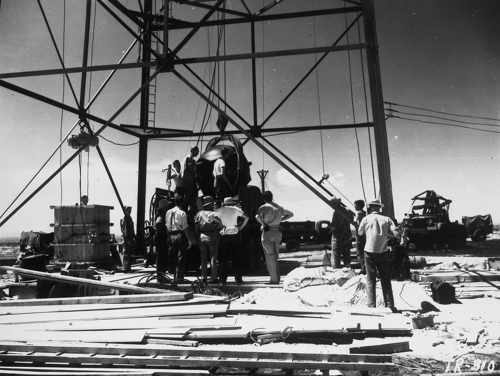 workers attaching worlds first atomic device to test tower prior to its july 16 detonation the desert site designated trinity, located on the almogordo bombing and gunnery range, now part of the northern end of the us armys white sands missile range in the jornada del muerto valley new mexico july 14, 1945 photo by los alamos national laboratorythe life images collection via getty imagesgetty images