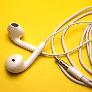 Yellow, Headphones, Technology, Cable, Gadget, Audio equipment, Electronic device, Wire, 
