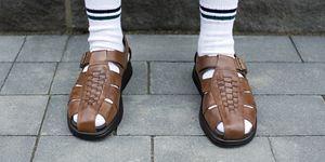 man wearing socks and sandals