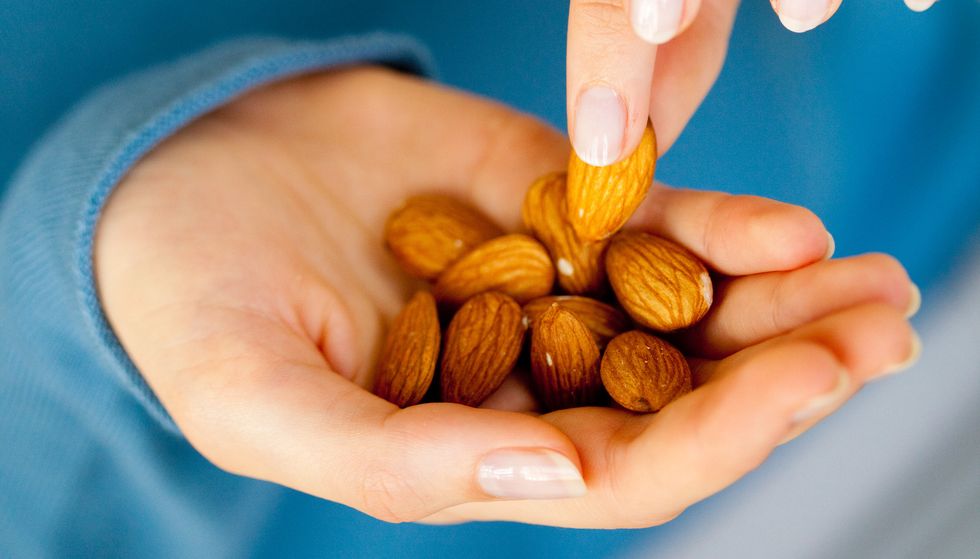 food, nut, hand, almond, nuts seeds, finger, ingredient, plant, cuisine, produce,