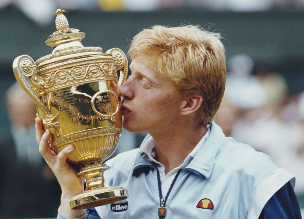 boris becker of germany kisses the gentlemans trophy to celebrate his victory over kevin curren 6 3, 6 7 4 7, 7 6 7 3, 6 4 during the mens singles final of the wimbledon lawn tennis championship on 7 july 1985 at the all england lawn tennis and croquet club in wimbledon in london, england it was beckers 1st career grand slam title and his 1st wimbledon title photo by steve powellallsportgetty images