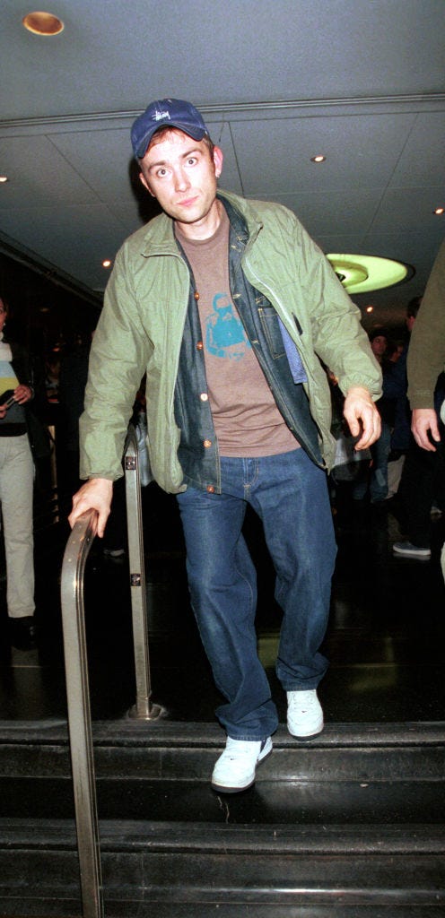 382176 02 italy out singer damon albarn of the group blur leaves the conan obrien show november 10, 2000 in new york city blurs new album, called best of album comes out november 21, 2000 photo by arnaldo magnaniliaison