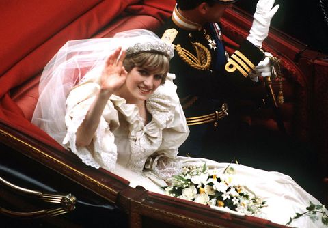 the prince and princess of wales return to buckingham palace by carriage after their wedding, 29th july 1981 she wears a wedding dress by david and elizabeth emmanuel and the spencer family tiara photo by terry fincherprincess diana archivegetty images
