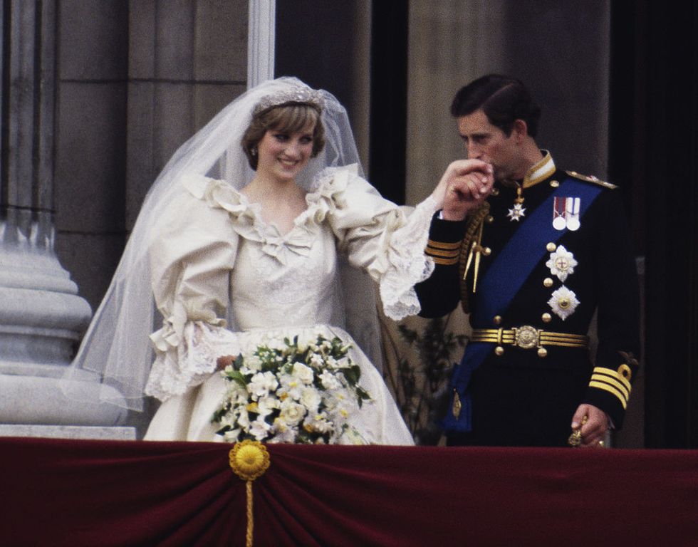 the prince and princess of wales on the balcony of buckingham palace on their wedding day, 29th july 1981 diana wears a wedding dress by david and elizabeth emmanuel and the spencer family tiara photo by terry fincherprincess diana archivegetty images