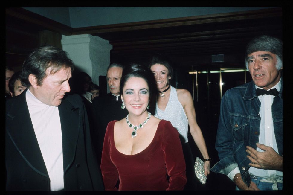 006911 01 actors richard burton and elizabeth taylor stand next to each other february 1, 1974 in switzerland oscar winner taylor made several relatively obscure movies in europe, including x, y and zee, ash wednesday and the drivers seat, while conducting a turbulent affair with burton photo by liaison