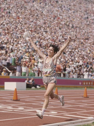 joan benoit of the united states raises her arms in celebration after winning the first ever olympic womens marathon event at the xxiii olympic summer games on 5th august 1984 at the los angeles memorial coliseum in los angeles, california, united states photo by tony duffyallsportgetty images