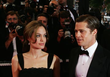 cannes, france may 21 actors brad pitt and angelina jolie attend the premiere for the film a mighty heart at the palais des festivals during the 60th international cannes film festival on may 21, 2007 in cannes, france photo by gareth cattermolegetty images