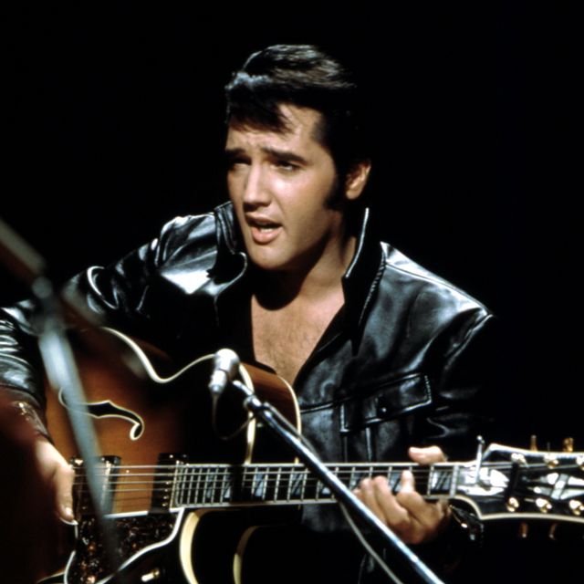 Rock and roll musician Elvis Presley performing