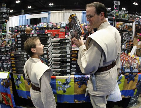 los angeles, united states star wars fans shop souvenirs during the opening day of "star wars celebration iv" in los angeles, 24 may 2007 the five day convention celebrates the 30th anniversary of the star wars saga afp photogabriel bouys photo credit should read gabriel bouysafp via getty images