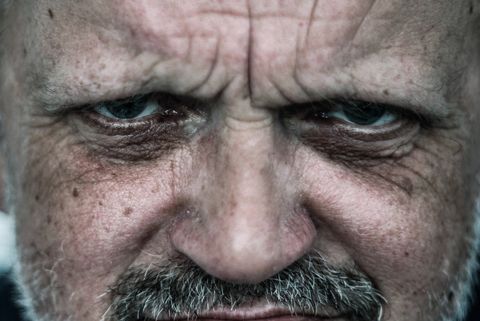 Close-Up Portrait Of Furious Mature Man
