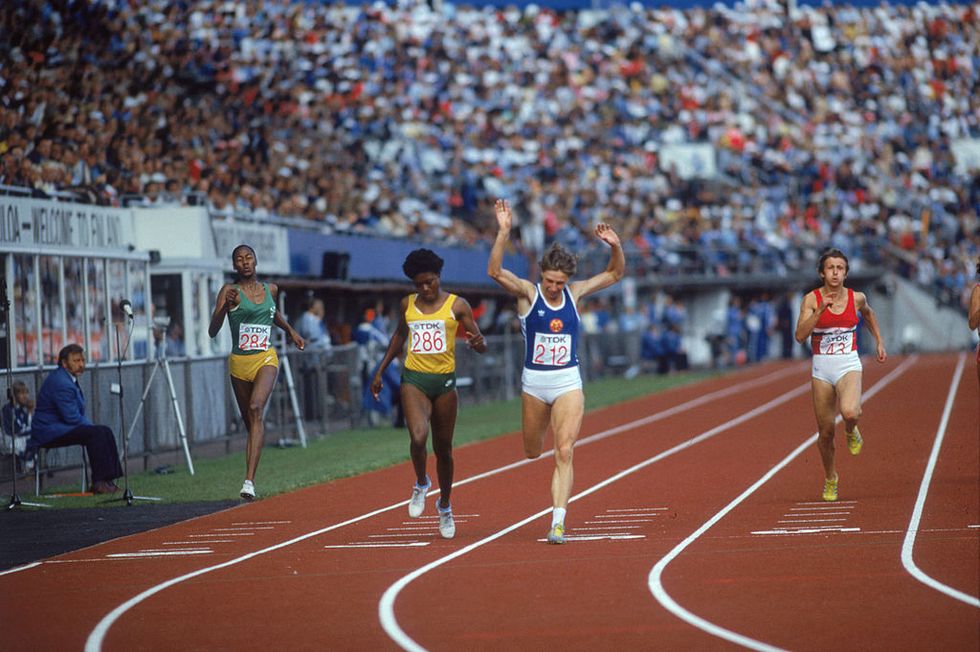 east german sprinter marita koch winning gold in the 200m at the 1983 world championships in helsinki