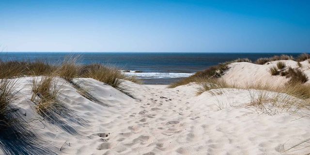Sand, Beach, Natural environment, Sky, Sea, Shore, Coast, Dune, Ocean, Aeolian landform, 
