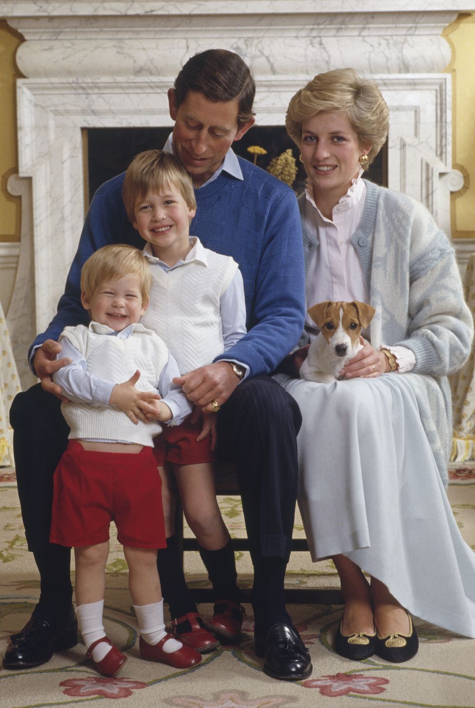 Prince Charles and  Princess Diana home in Kensington Palace, London, with their sons Prince William and Prince Harry (front), December 1986