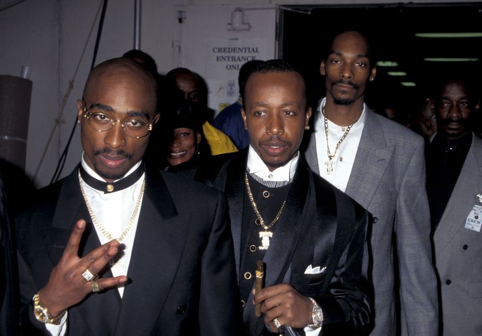 tupac shakur, mc hammer and snoop dogg at the shrine auditorium in los angeles, california photo by jim smealron galella collection via getty images