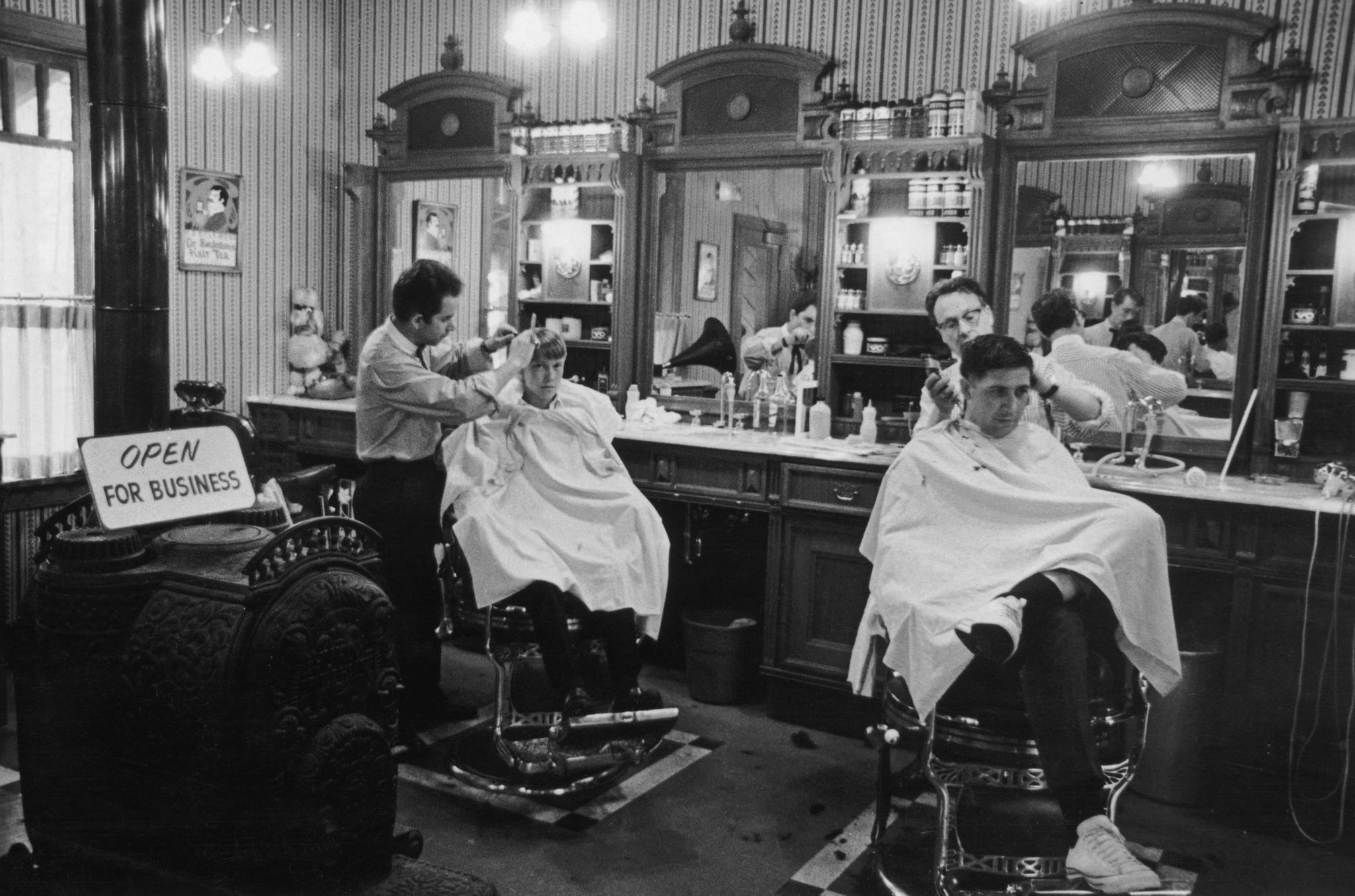 barbers at work in a traditional barbers shop, circa 1970 photo by fox photoshulton archivegetty images