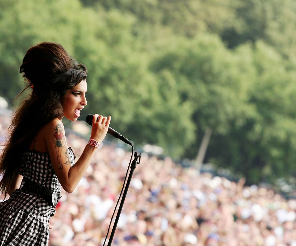 chicago august 05 singer amy winehouse performs on the bud light stage at lollapalooza 2007 in grant park on august 5, 2007 in chicago, illinois photo by jason squireswireimage