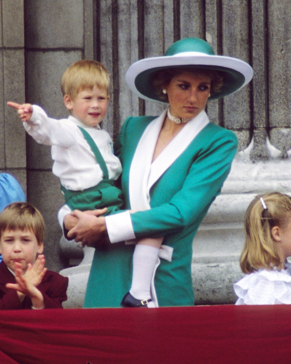 london, england june 11 l r princess margaret, countess of snowdon, prince william, diana, princess of wales, wearing a green dress with a white collar and matching hat designed by philip somerville and holding prince harry, lady rose windsor, lady davina windsor, princess michael of kent and lord frederick windsor stand on the balcony of buckingham palace following the trooping the colour ceremony on june 11, 1988 in london, england photo by anwar husseinwireimage