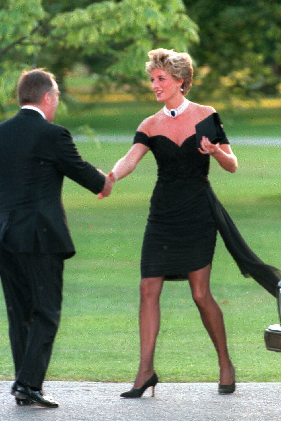 london, united kingdom november 20 diana, princess of wales, wearing a stunning black dress commissioned from christina stambolian, attends the vanity fair party at the serpentine gallery on november 20, 1994 in london, england the famous black revenge dress was a spectacular coup by the princess, worn on the very evening that prince charles made his notorious adultery admission on television photo by anwar husseinwireimage