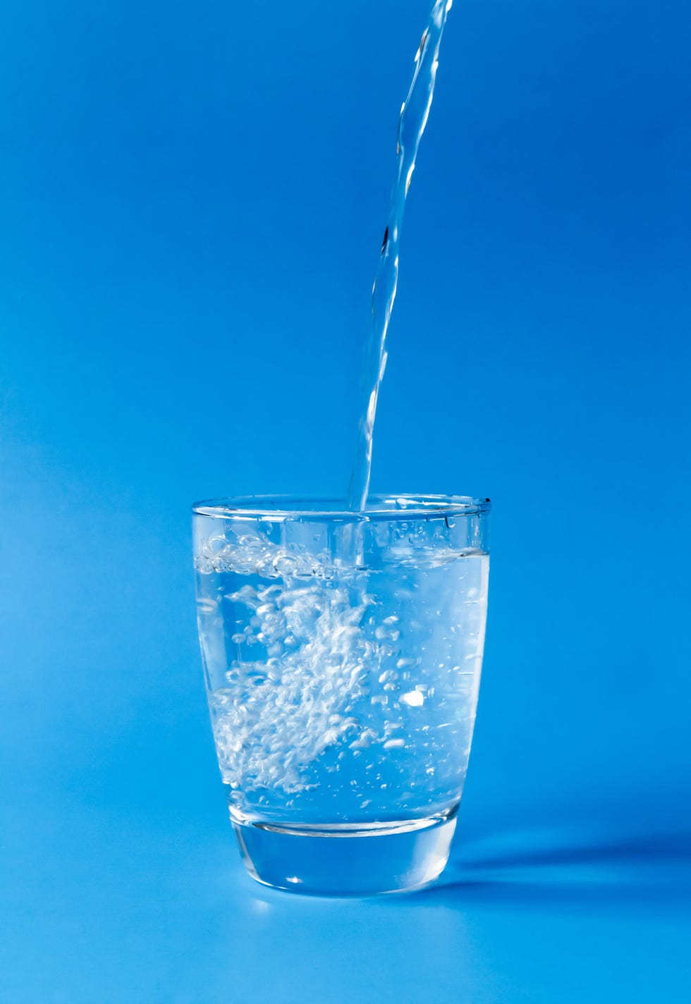 Water, Blue, Liquid, Drink, Transparent material, Glass, Drinking water, Ice cube, Highball glass, Old fashioned glass, 