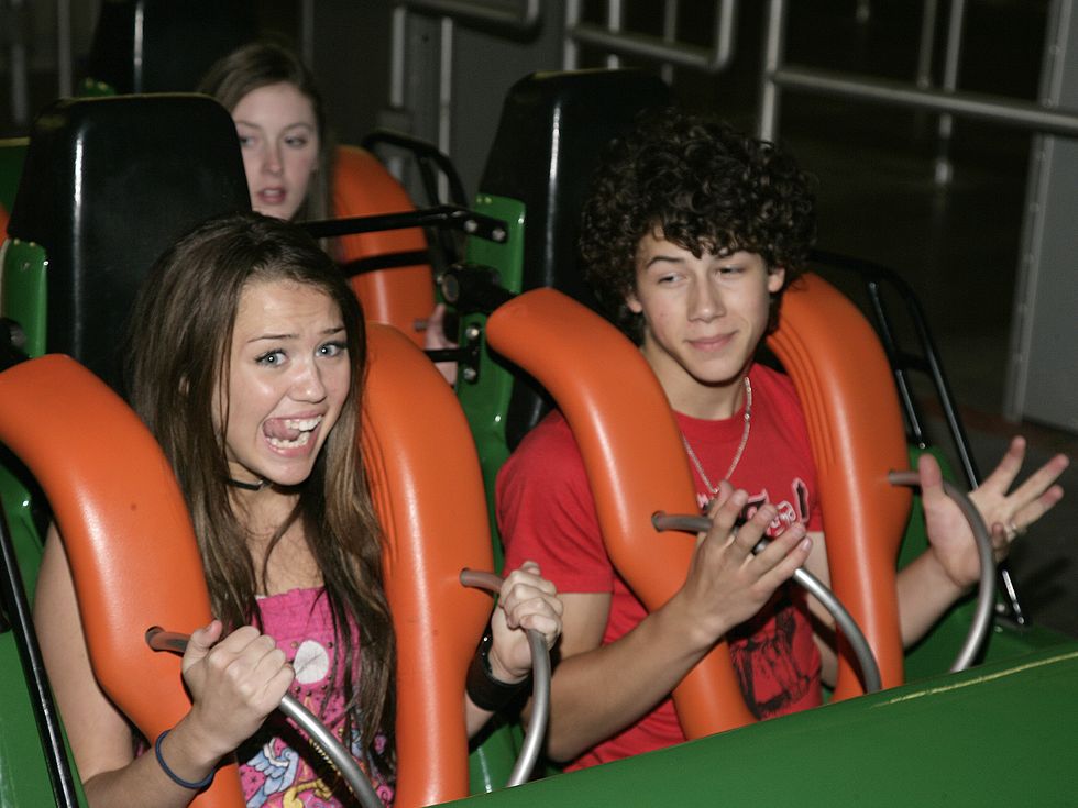 miley cyrus and the honas brothers visit six flags magic mountain
