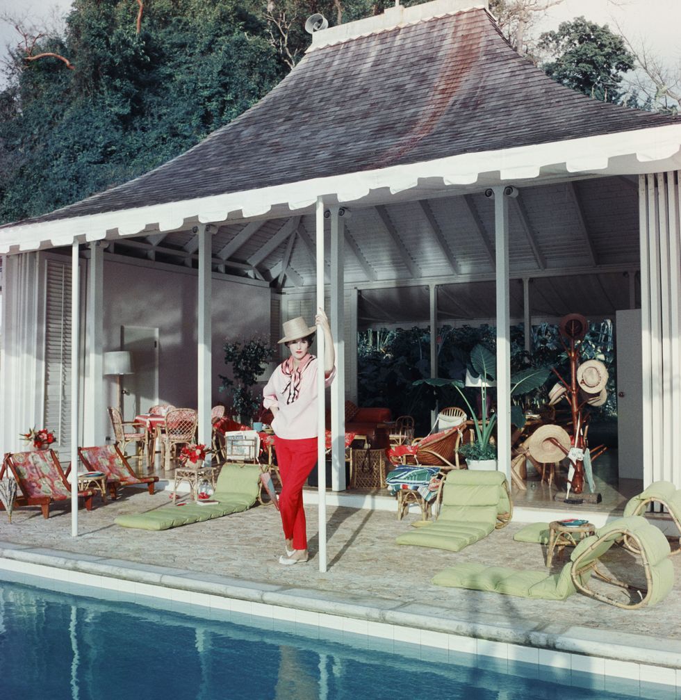 american socialite babe paley 1915 1978, the wife of cbs radio executive william s paley, beside the pool at round hill, their villa in jamaica, 1959 photo by slim aaronshulton archivegetty images