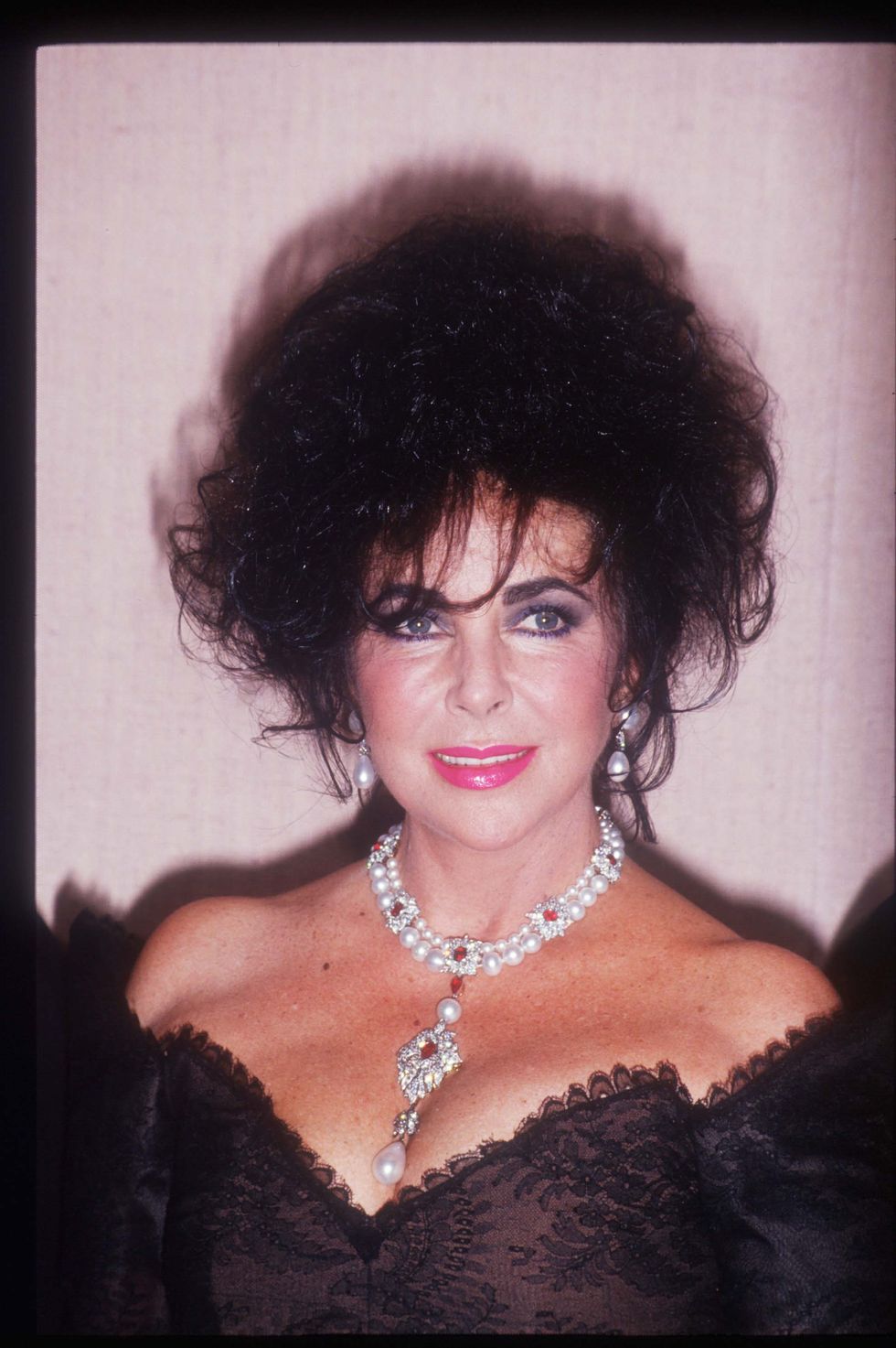 113442 01 actress elizabeth taylor stands january 19, 1992 in los angeles, ca taylor became a child star after her appearance in national velvet and later won academy awards for her performances in butterfield 8 and  whos afraid of virginia woolf photo by barry kingliaison