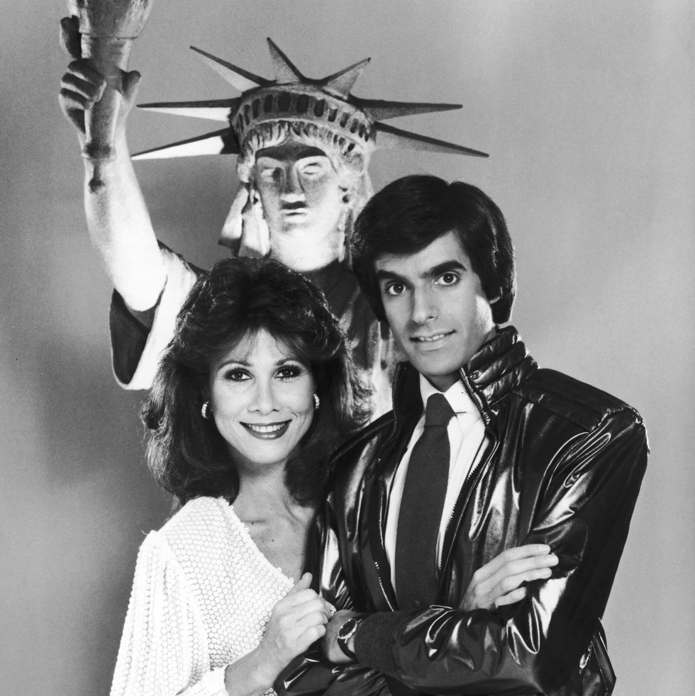 american magician david copperfield with actress and singer michele lee, who is to guest star in the illusionists upcoming cbs special, entitled the magic of david copperfield v the statue of liberty disappears, 1983 photo by archive photosgetty images